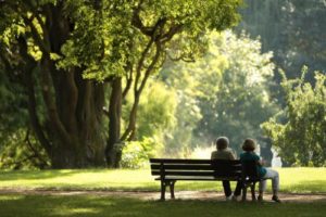 two people on a bench discussing cognitive processing therapy